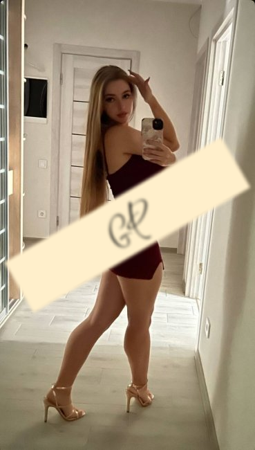 Мила
